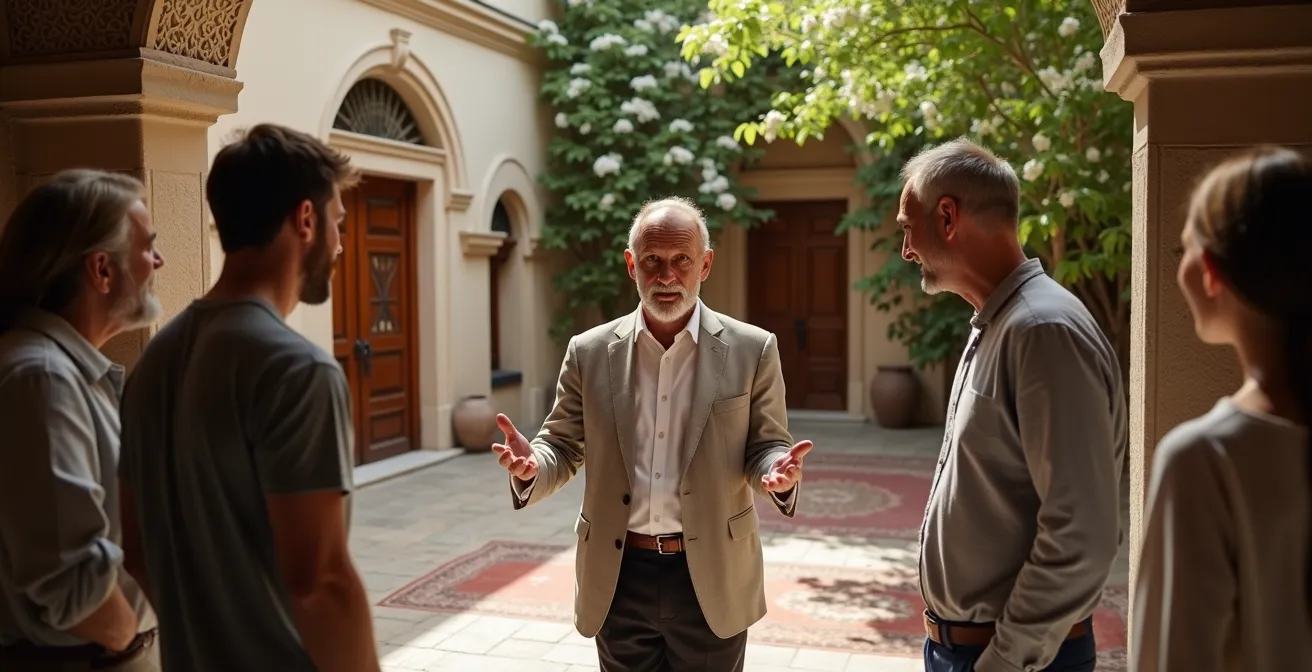 Propriétaire d'hôtel de charme turc accueillant des voyageurs dans son établissement historique